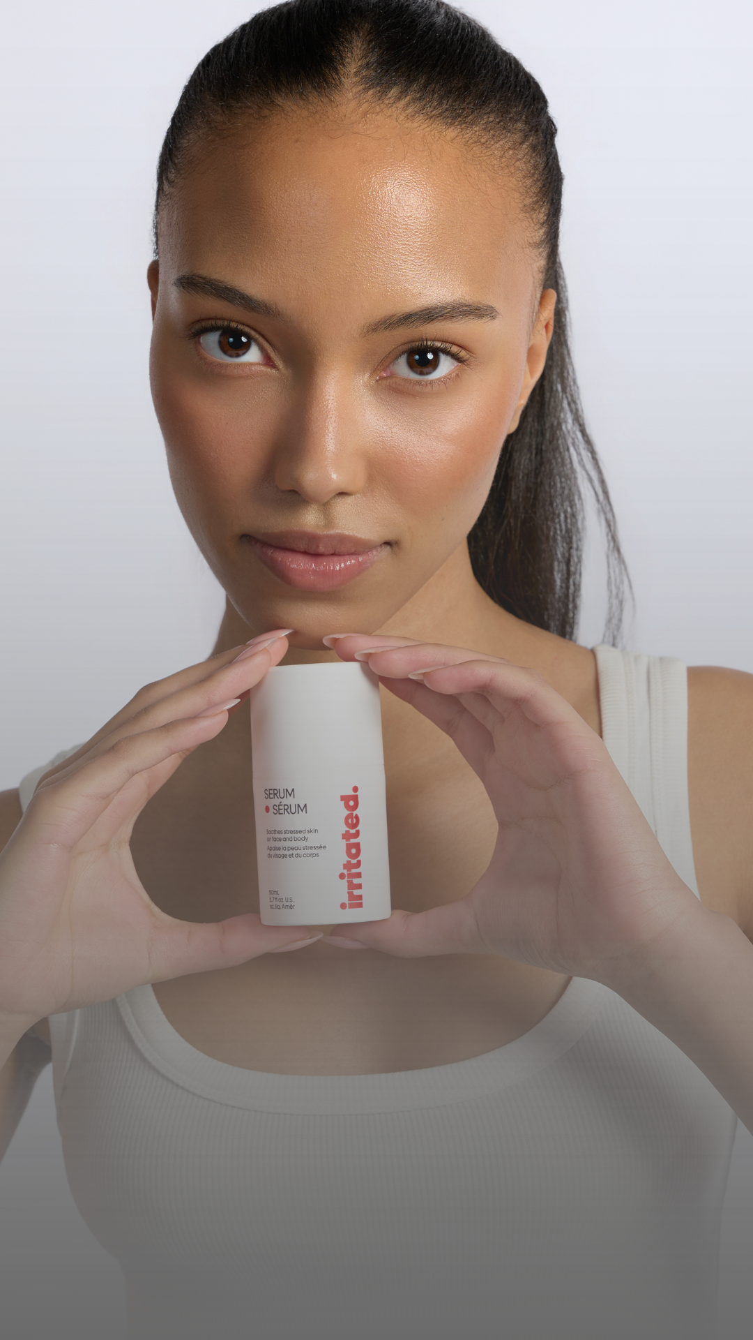 Ella MacCuish holding Irritated serum EU compliant fragrance free safe for sensitive skin Canada