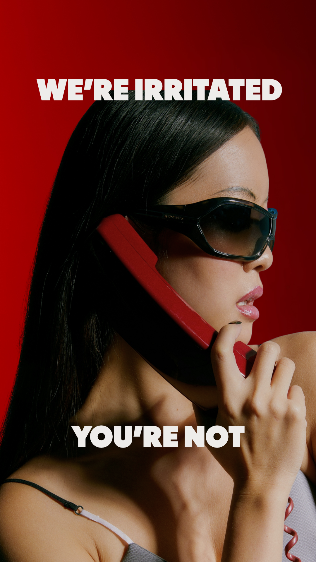 Irritated skincare brand campaign image woman on red background fragrance free serum Canada